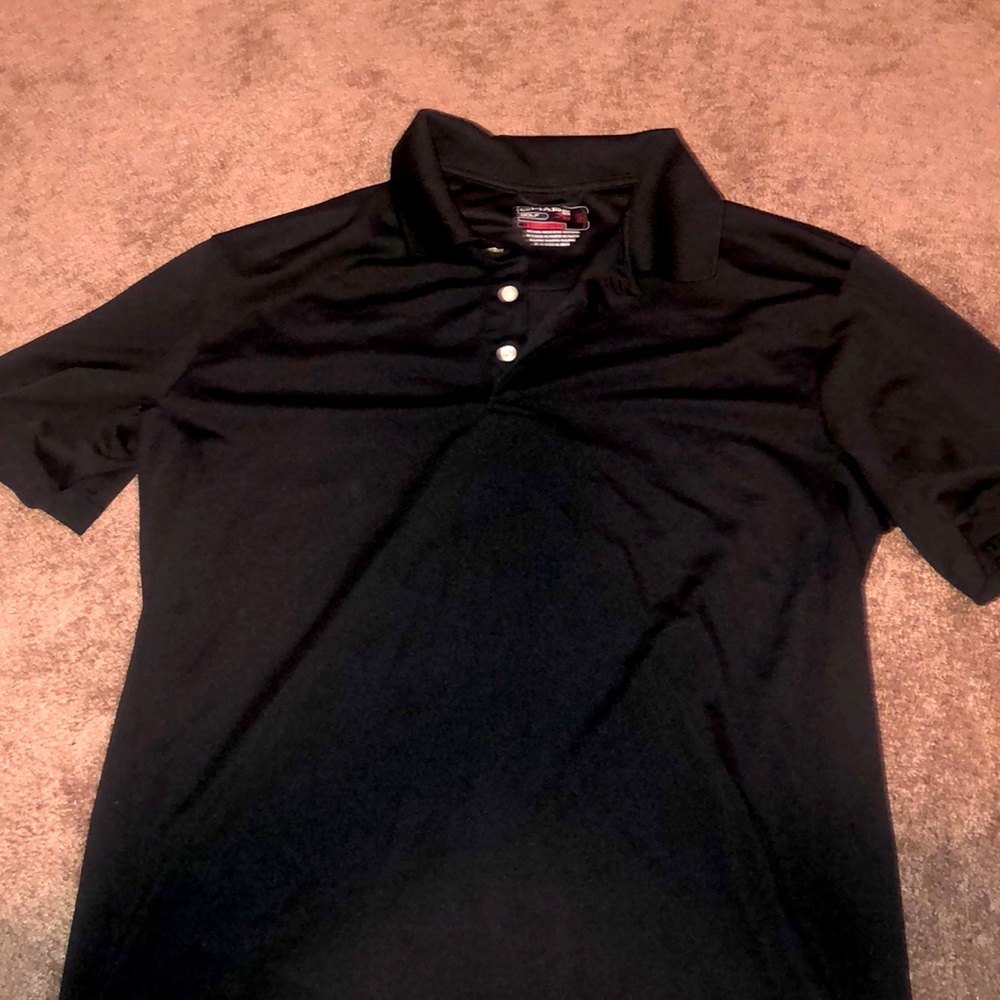 A black golf tee